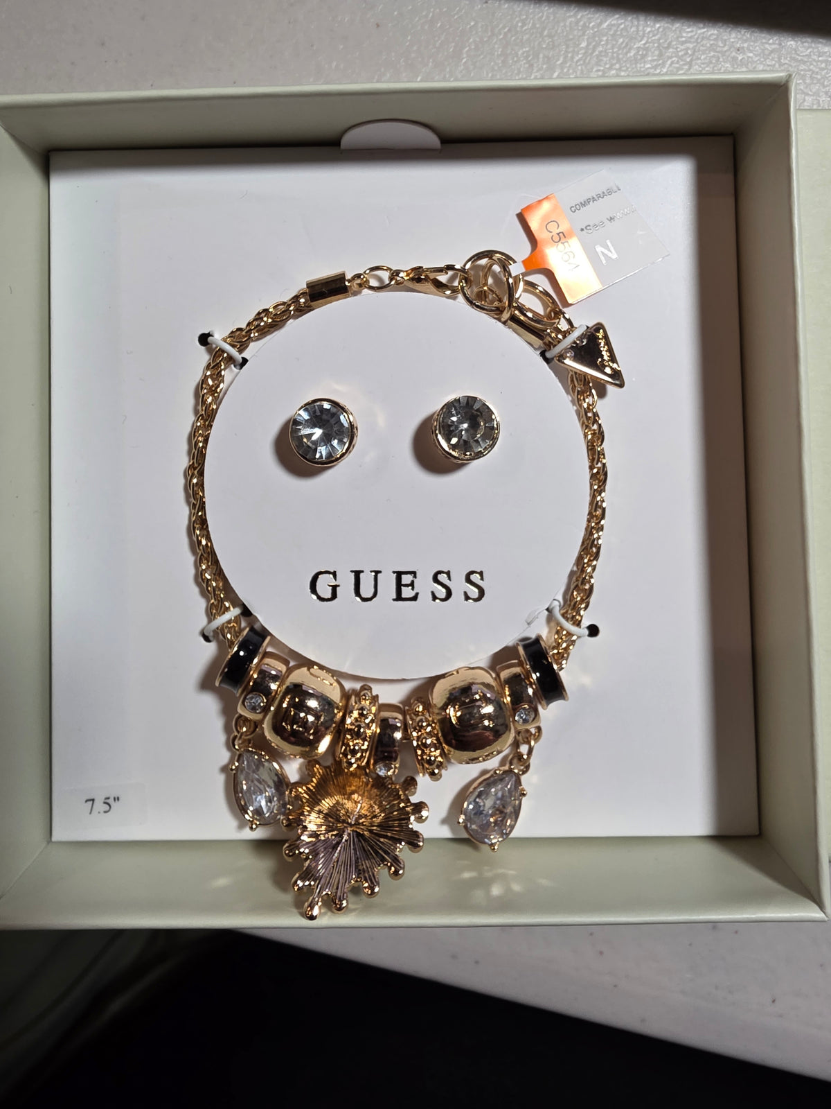 Guess Bracelet and earrings gold C5564 and D1652 Ross HNL 2026