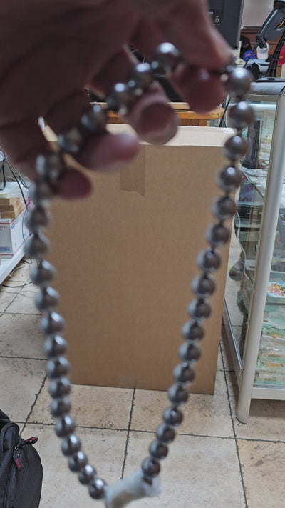 Silver pearl necklace with glitter ball