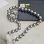 Silver pearl necklace with glitter ball