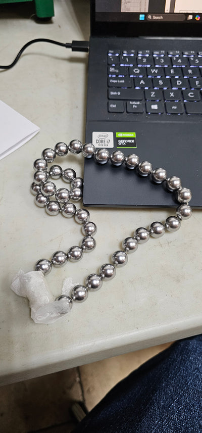 Silver pearl necklace with glitter ball